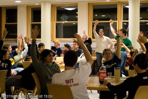 Baker House residents vote on the Preferred Dining membership at last night's house meeting.