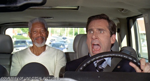Evan Baxter (played by Steve Carell) realizes that God (played by Morgan Freeman) is in the back seat of his Hummer.