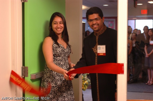iHouse President Priyanka Jain ’09 and Raja H.R. Bobbili ’08 cut the ribbon to officially open iHouse as a new undergraduate residence Tuesday.