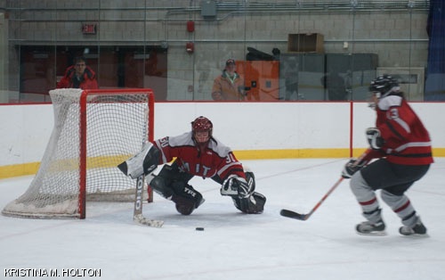 Julia N. Roberts ’10 goes for the save during the women’s ice hockey game on Friday against the Rochester Institute of Technology.