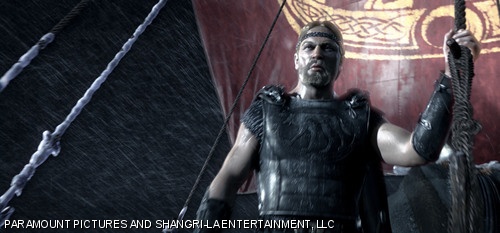 The Viking hero, Beowulf (played by Ray Winstone), sets sail in search of future glory in “Beowulf.”