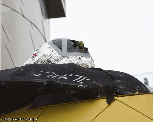 A UFO appears atop one of the Stata Center’s roofs courtesy of MIT hackers on Sunday.