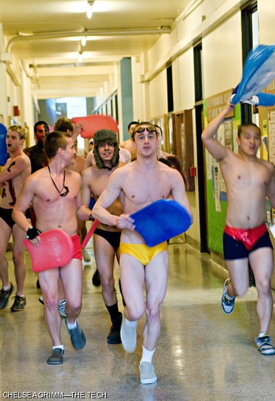 The scantily-clad men’s swim team cheered through the Infinite on Thursday in celebration of Sunday’s NEWMAC title win.