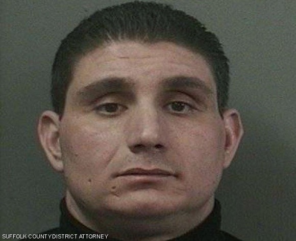 MIT Campus Police officer Joseph D’Amelio was arrested Saturday on drug trafficking charges after receiving a package containing hundreds of prescription painkiller tablets at an auto shop in East Boston.