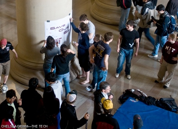 MIT student athletes gathered in Lobby 7 on Tuesday for a demonstration to raise awareness of DAPER’s plan to cut varsity sports teams in response to department budget cuts.