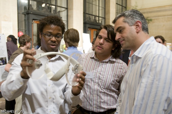 Renaldo M. Webb ’10 (left) presented his project for the 2009 MIT IDEAS Competition at a poster and judging event on Monday evening in Lobby 10 and the Bush room.