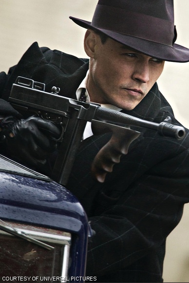 Johnny Depp channels his suave and brooding side as criminal anti-hero John Dillinger.