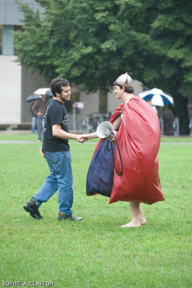 Generals Daniel J. Sauza ’11 of West Campus (left) and James A. Ostrowski ’10 of East Campus (right) shake hands Saturday before the start of the annual East vs. West Water War on Kresge Oval.