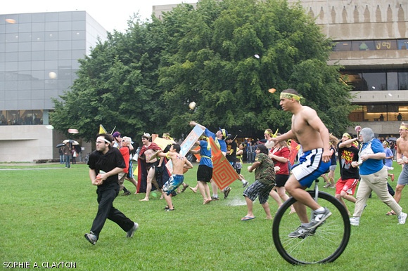 The east campus army charges at the beginning of the annual East vs. West Water War Saturday on Kresge Oval.