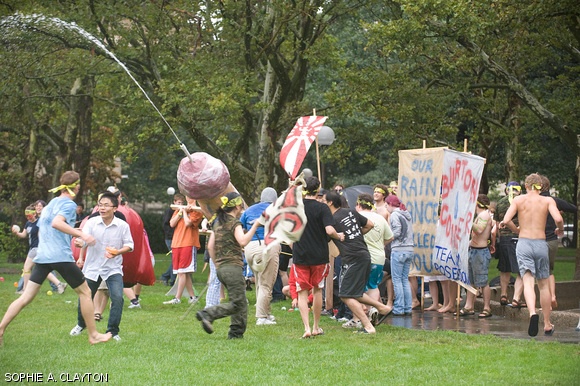 East campus wheels out one of their weapons, a giant water-squirting penis, during the annual East vs. West Water War Saturday on Kresge Oval.