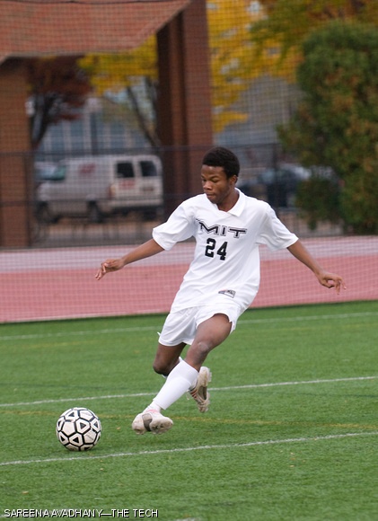 Samuel D. Acquah ’12 squares up the ball during the Engineer’s 4-1 win against Elms College on the Steinbrenner Stadium turf Wednesday afternoon.