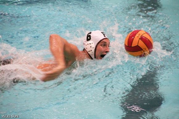 Nikola B. Otasevic ’12 advances the ball down the pool on Oct. 17 during the men’s water polo game versus Fordham University. MIT lost 7-6.