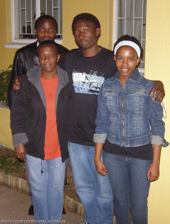 Zwane (second from right) and family, during a visit with his MIT Educational Counselor in South Africa before he left for the U.S. in 2008.