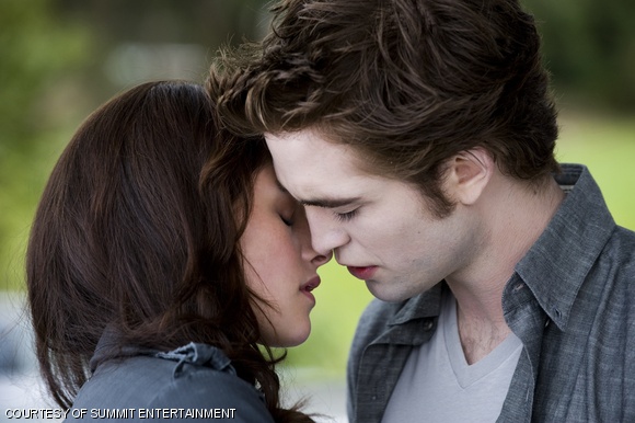Bella (Kristen Stewart) and Edward (Robert Pattinson) share an intimate moment.
