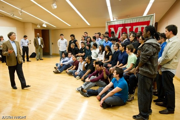 A group of MIT Gates Millennium Scholars assembles to meet Bill Gates during his visit to MIT on Wednesday.