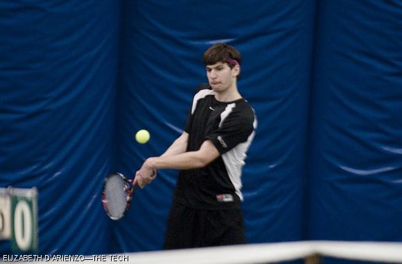 Matthew T. Skalak ‘13 prepares to volley the ball at the tennis team’s first match of the spring season, against Emerson College on Wednesday. Skalak was one of four freshmen singles players.