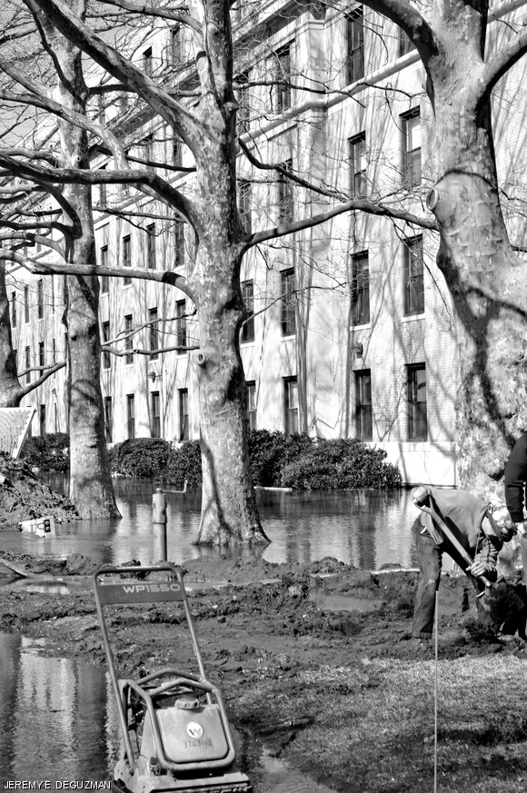 The west parallel of East Campus flooded early Tuesday afternoon due to the installation of a fire hydrant. Workers took most of the day to stop the flood.