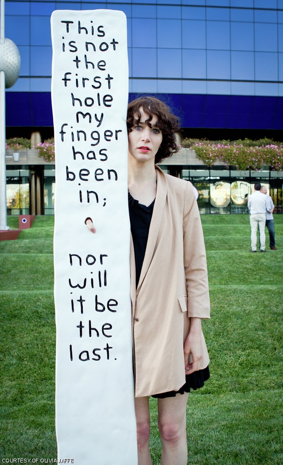 Miranda July poses with one of her installation pieces from Eleven Heavy Things.
