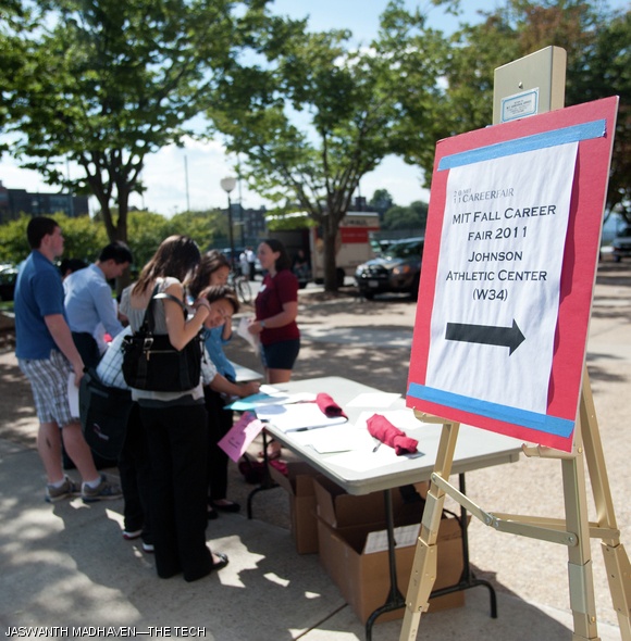 Students gather at information desks outside Johnson Athletic Center to learn more about Career Fair and the 350 participating companies.