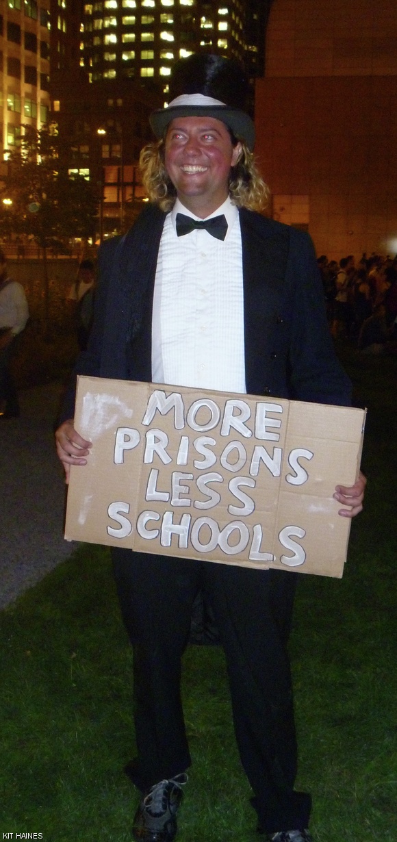A protester at Occupy Boston tries to capture what he sees as the absurdity of the state of the nation by being absurd and ironic himself.