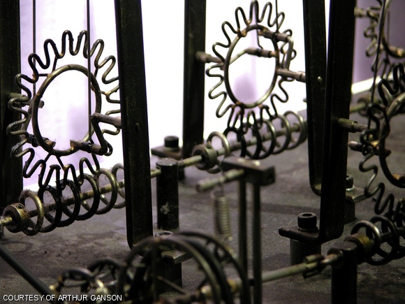 Detail of the coupled gear systems in “Machine with 11 Scraps of Paper” from Arthur Ganson’s Gestural Engineering exhibit.