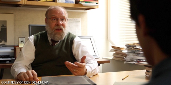 Professor Smith (Zachary Abbott) stares down a grad student in the PhD movie.