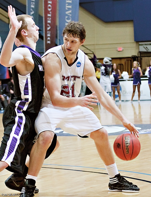William Tashman ’13 holds his own against the Warhawks during MIT’s Final Four game.