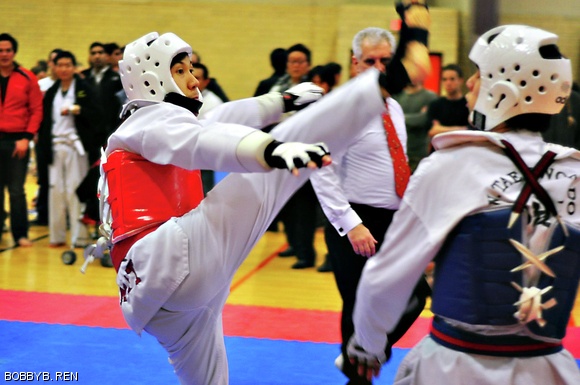 Maksim Stepanenko ’12 throws a head kick while competing in the Men’s B Team division at the Eastern Collegiate Taekwondo Conference.