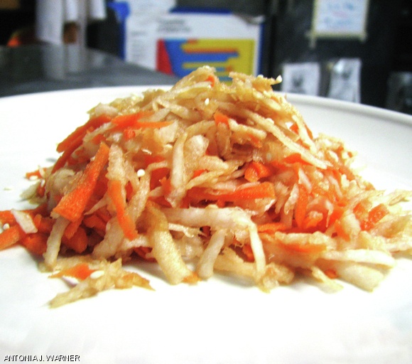 The flavors of daikon radish and carrots mingle with soysauce, vinegar, and sesame oil for a strong and refreshing salad.
