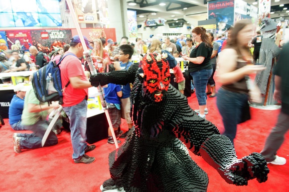 At the Lego Booth, a Darth Maul Lego sculpture stands ready to attack!