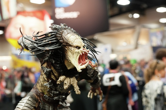 A Predator sculpture terrorizes the convention floor.