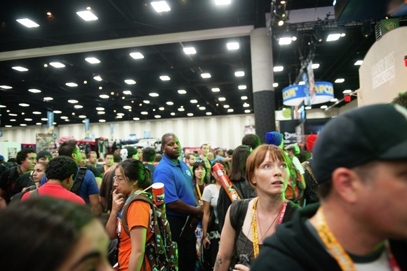 Convention-goers flood the expo floor on preview night, the start of Comic-Con.