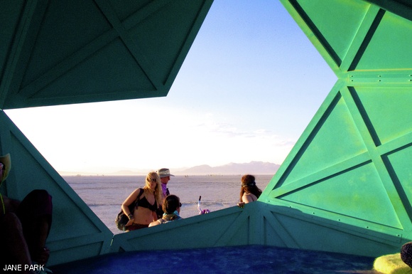 Burners relax under the waning sun.