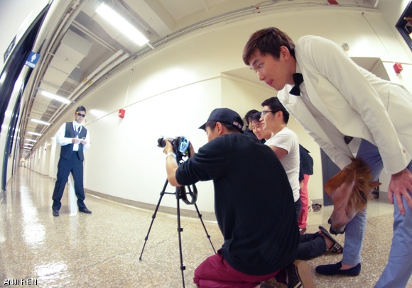 Richard C. Yoon ’13 is filmed in the Main Group.