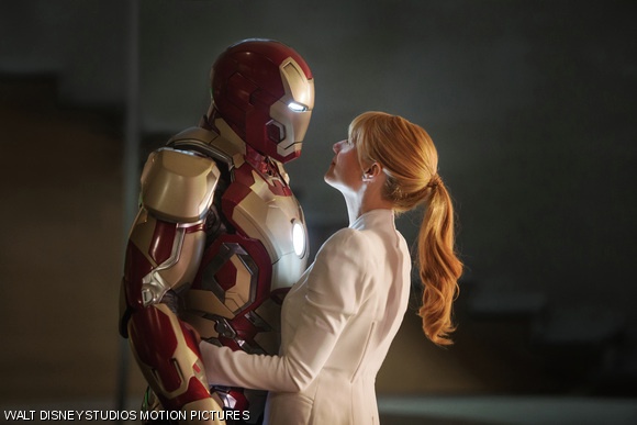 The (empty) Iron Man suit and Pepper Potts (Gwyneth Paltrow) in Iron Man 3.