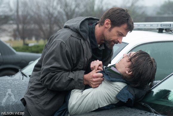 Keller Dover (Hugh Jackman) and Alex Johnes (Paul Dano) in Prisoners.