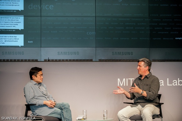 Author Daniel Suarez (right) discusses his publications during a conversation with Joi Ito (left) at the Media Lab on Tuesday, Sept. 24.