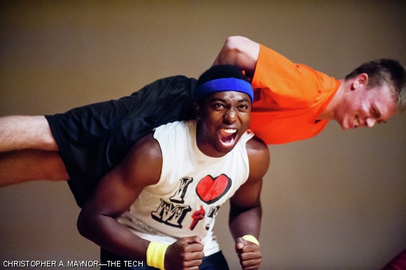 John O. Bolaji ’16 squats a fellow Kappa Sigma brother on stage at Sunday evening’s Late Night event. There were more than twenty acts in this year’s philanthropic event, which is hosted by Sigma Kappa sorority. All profits go towards the Sigma Kappa Foundation to support Alzheimer’s research.