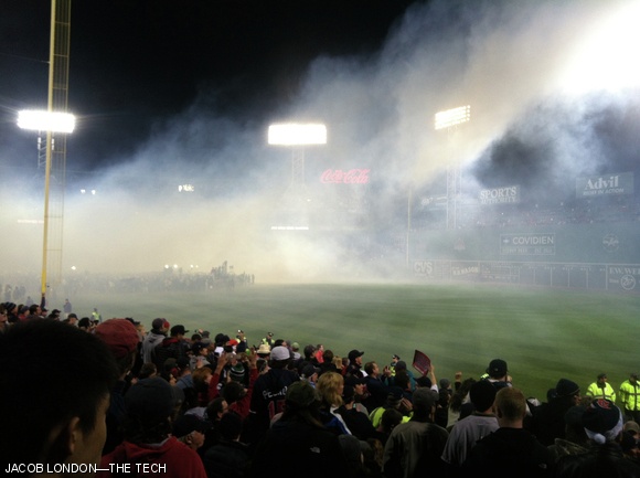Smoke from fireworks tumbled onto the diamond at Fenway Park after the Red Sox clinched their 8th World Series title.