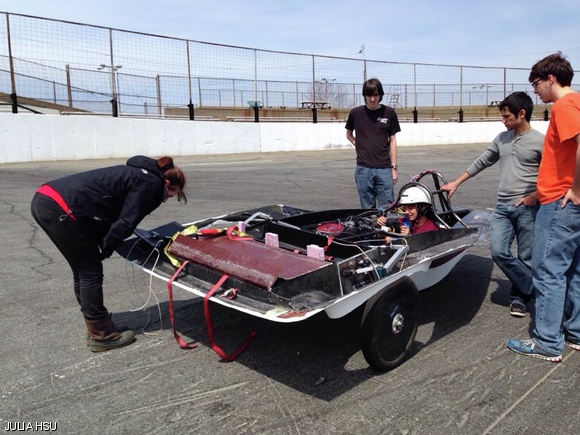 Rose A. Abramson ‘14, the SEVT electrical lead, checks Valkyrie’s battery pack during Tuesday’s track testing.