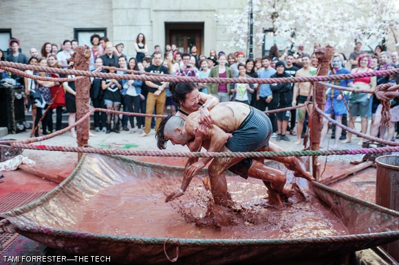 Laura Y. Zhang ‘15 and Joshua ‘Muffin’ Gordonson mud wrestle at Senior House’s Steer Roast this Friday. Other events included numerous musical performances over the weekend as well as a feast Saturday afternoon.