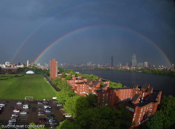 Two vibrant rainbows appeared spanning the Charles River after the rain last Friday.