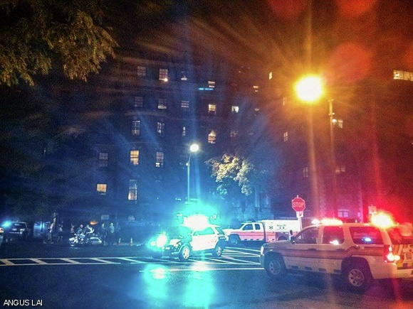 Emergency personnel arrive Sunday night in response to reports of a student’s fall from a window at Lambda Chi Alpha. The student was not affiliated with MIT.
