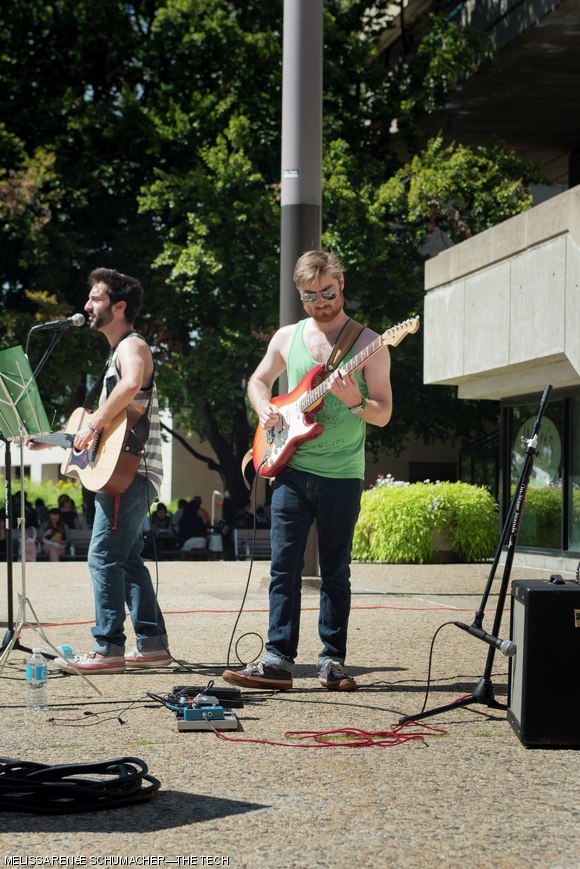 Jake Ohlbaum and Harry Price, members of the Black Moons, perform on the steps of the Student Center on Thursday. The event was part of the Coffeehouse Lounge program, a weekly concert series.