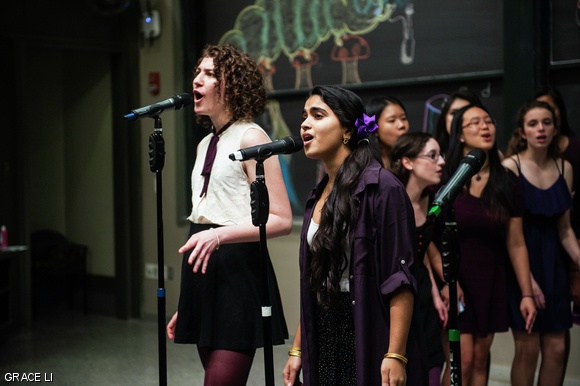 Kathryn A. Gertz ’15 (left) and Sruthi A. Narayanan ’16 (right) perform a duet during Muses in Wonderland concert held Sunday night in 10-250.