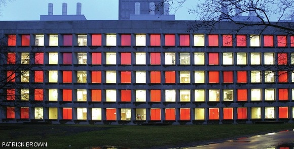 On the day of the divestment debate organized by MIT, activists put on a display reading “DIVEST” in the windows of the five floors of Building 18.