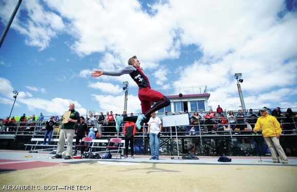 William R. Ruschel ’18 soars above the jumping pit during the New England Women’s and Men’s Athletic Conference championship on Saturday. MIT won the championship for the 15th straight year.