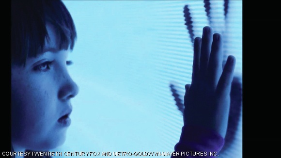 Madison Bowen (Kennedi Clements) reaches out to apparitions that have invaded her home.