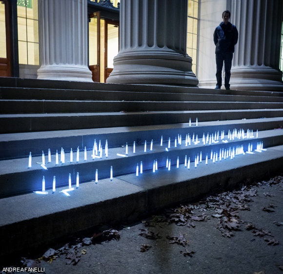 Participants in a silent walk against terrorism placed lights on the steps outside Memorial Lobby (Lobby 10) as symbols of hope, remembrance, and solidarity on Wednesday evening.