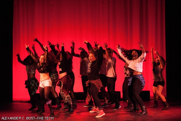 Dancers gesture during “Girl with the Ratchet Earring.”